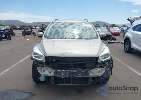 2017 Ford Escape Titanium z USA, uszkodzony, nr VIN 1FMCU0JD7HUD84006